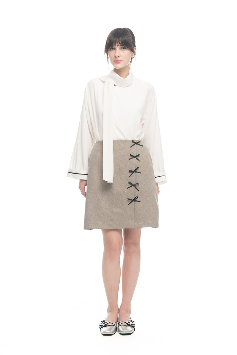 Bow Embellished Mini Skirt In Taupe